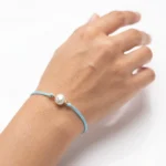 دستبند طلا و نخ البرنارد و مروارید
